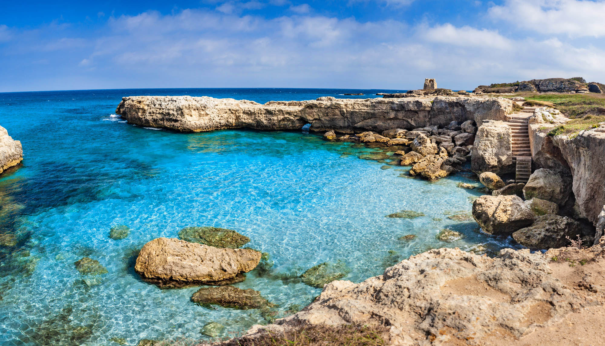 Baia di Portulignu: Il Paradiso Segreto di Roca Vecchia nel Salento
